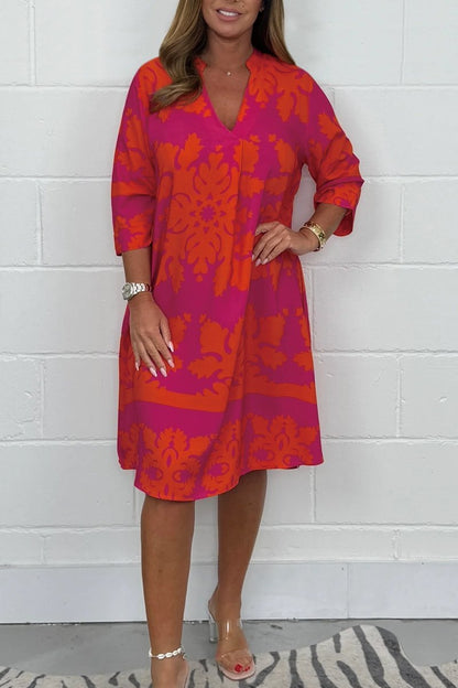 Women's V neck patterned tunic long sleeve dress